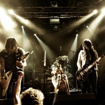 Dying For Some Action live on Stage (2012).